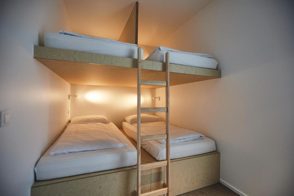 Postel nebo postele na pokoji v ubytování Vakantiewoning Het Kasterhuis