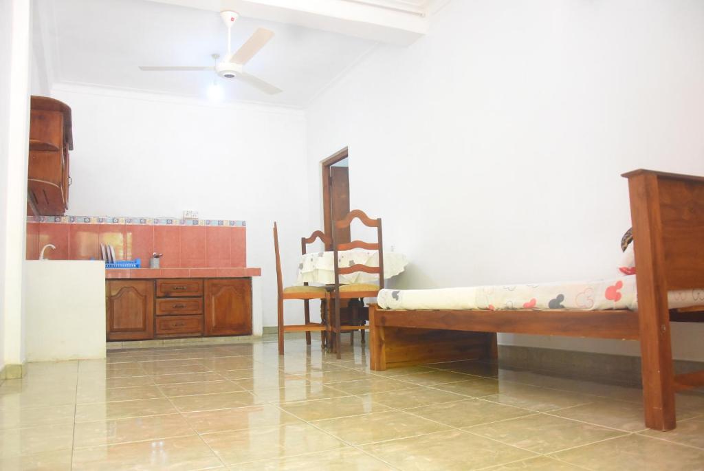 Postel nebo postele na pokoji v ubytování Insa Guest House Kandy