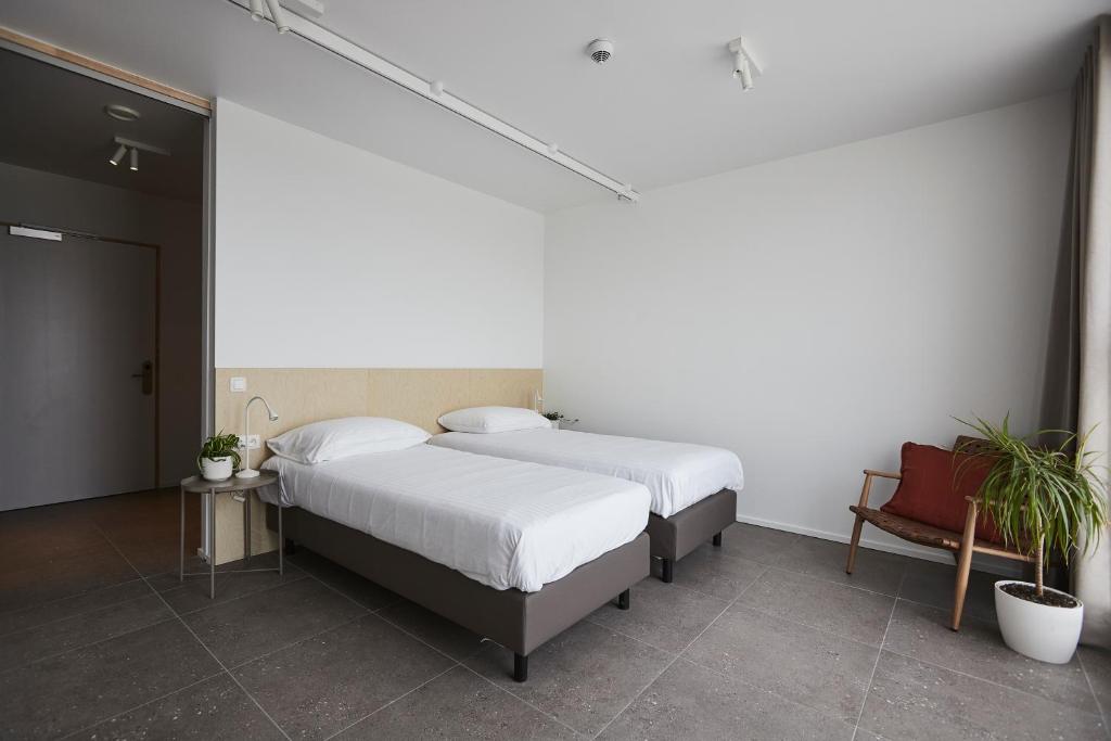 Postel nebo postele na pokoji v ubytování Vakantiewoning Het Kasterhuis