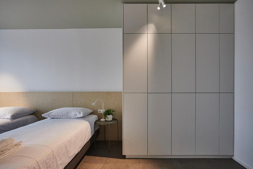 Postel nebo postele na pokoji v ubytování Vakantiewoning Het Kasterhuis