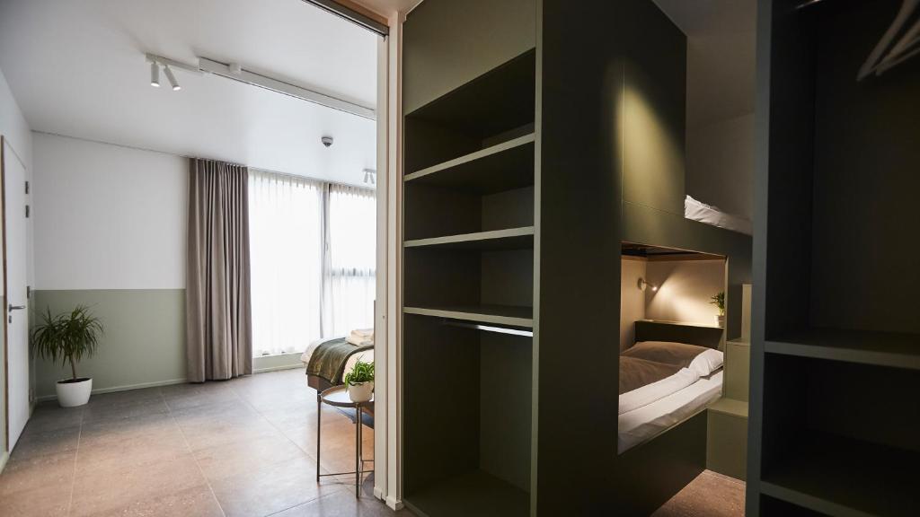Postel nebo postele na pokoji v ubytování Vakantiewoning Het Kasterhuis