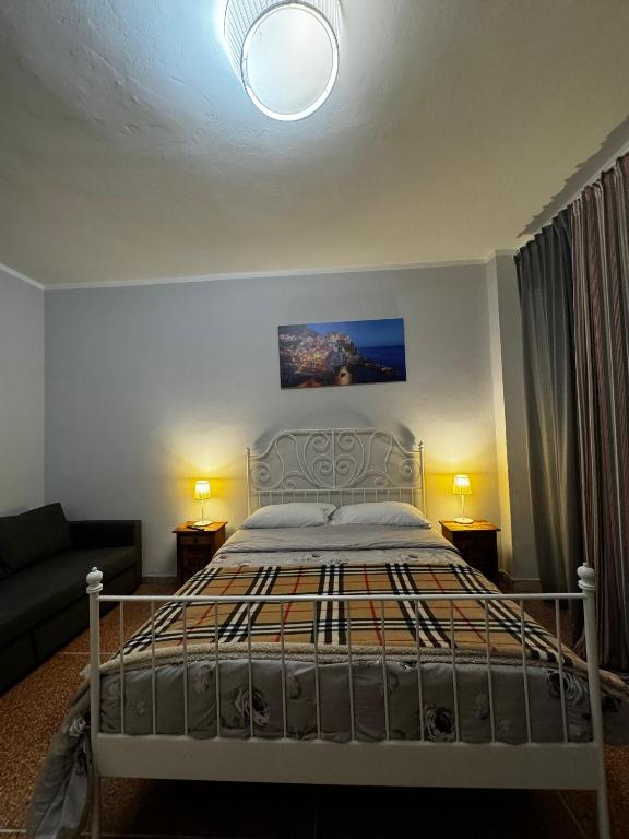 Posteľ alebo postele v izbe v ubytovaní City Rooms