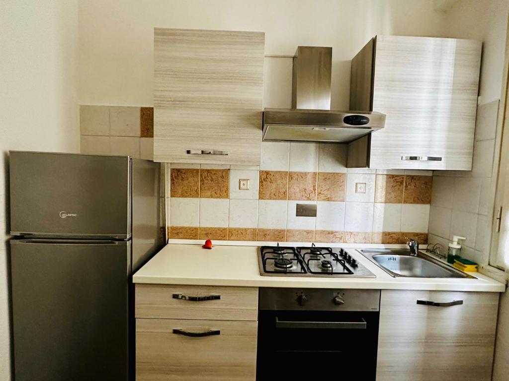 Kuchyňa alebo kuchynka v ubytovaní City Rooms