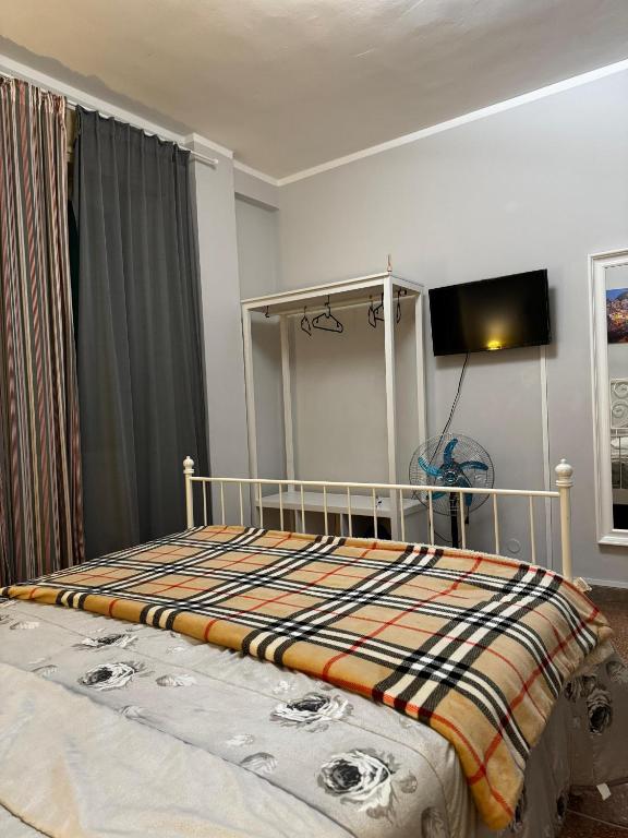 Posteľ alebo postele v izbe v ubytovaní City Rooms