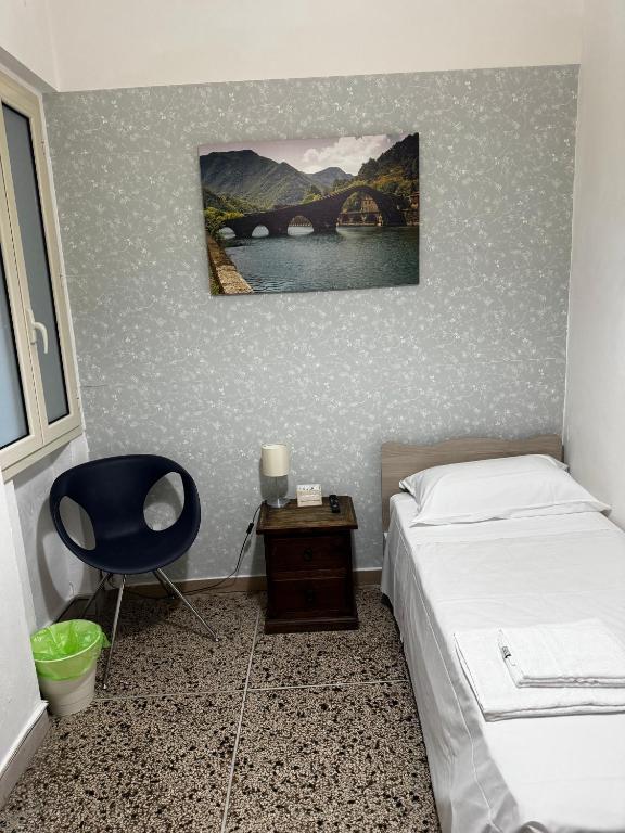 Posteľ alebo postele v izbe v ubytovaní City Rooms