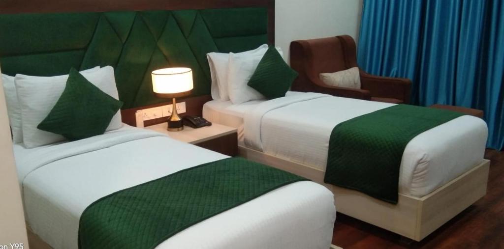 Postel nebo postele na pokoji v ubytování ECONOH HOTEL