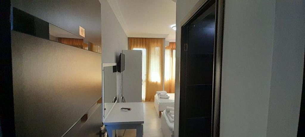 TV a/nebo společenská místnost v ubytování Hotel 288a