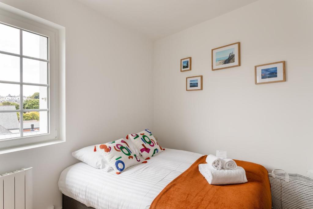 Postel nebo postele na pokoji v ubytování Le Clos Émeraude - Appt de 30 m² à Dinard