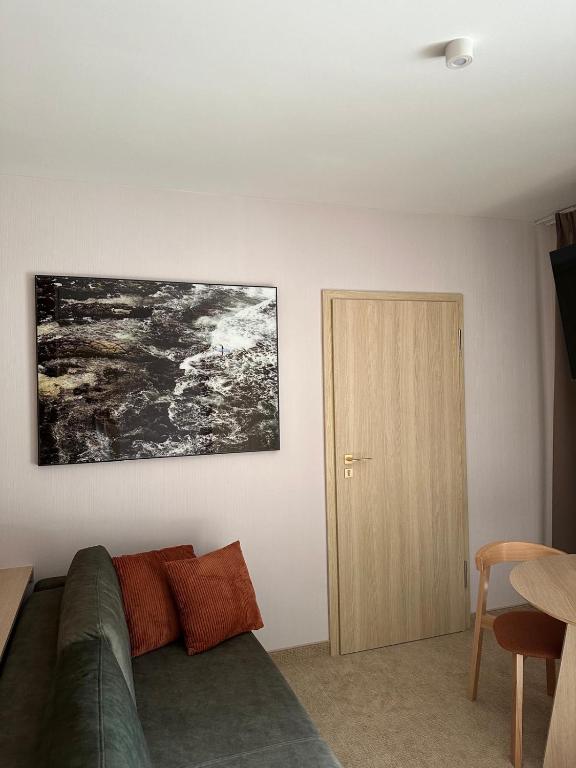 Posezení v ubytování Apartamenty Joy Me Łukęcin
