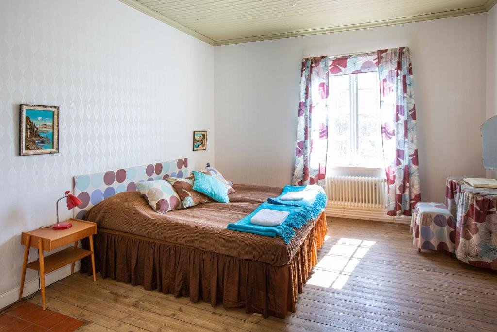 Postel nebo postele na pokoji v ubytování STF Sala Silvergruva Vandrarhem