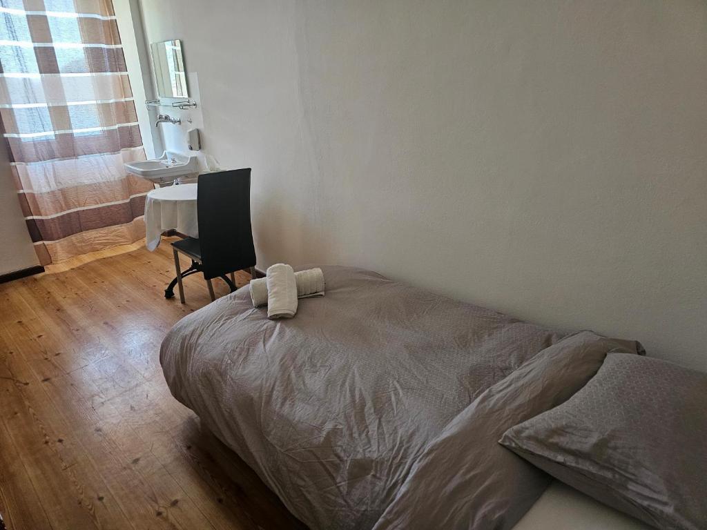 Postel nebo postele na pokoji v ubytování Ristorante Camino
