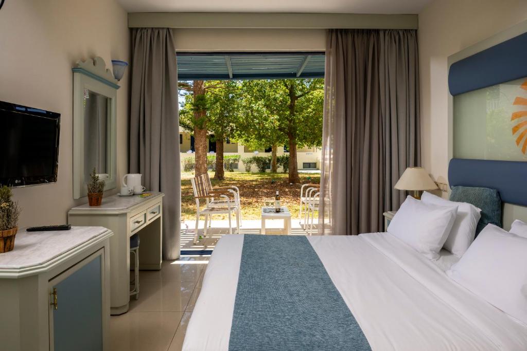 Posteľ alebo postele v izbe v ubytovaní Mare Blue Hotel
