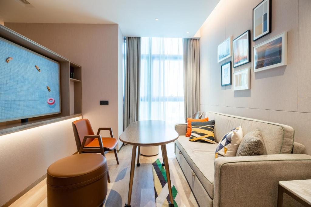 Posezení v ubytování Home2 Suite by Hilton Shenzhen Bao'an