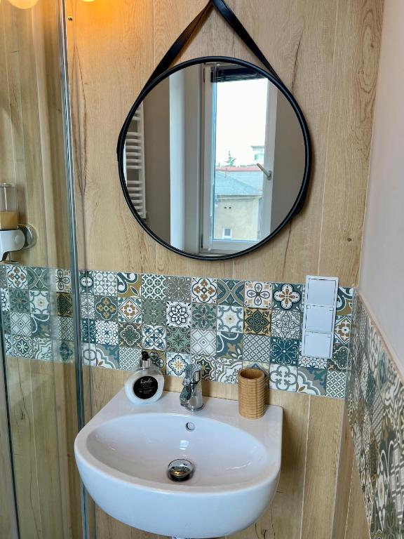 Kúpeľňa v ubytovaní Apartamenty Wolności 18