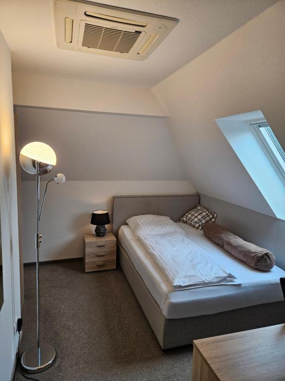 Postel nebo postele na pokoji v ubytování Hotel Bohlje