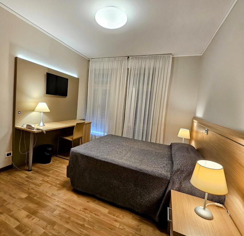 TV a/nebo společenská místnost v ubytování Hotel Eurovil Garni