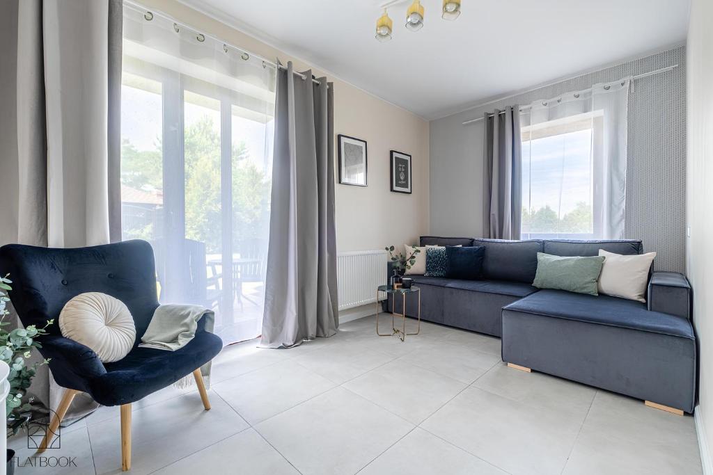 Χώρος καθιστικού στο Lazurowy Dwór - Nadmorskie Apartamenty z Basenem oraz Restauracją w Sztutowie