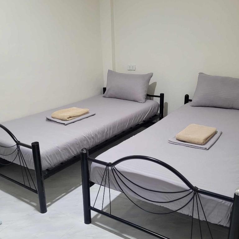 Postel nebo postele na pokoji v ubytování Borj Hotel