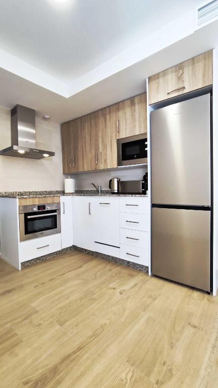 Kuchyň nebo kuchyňský kout v ubytování Terraza Suites Benidorm