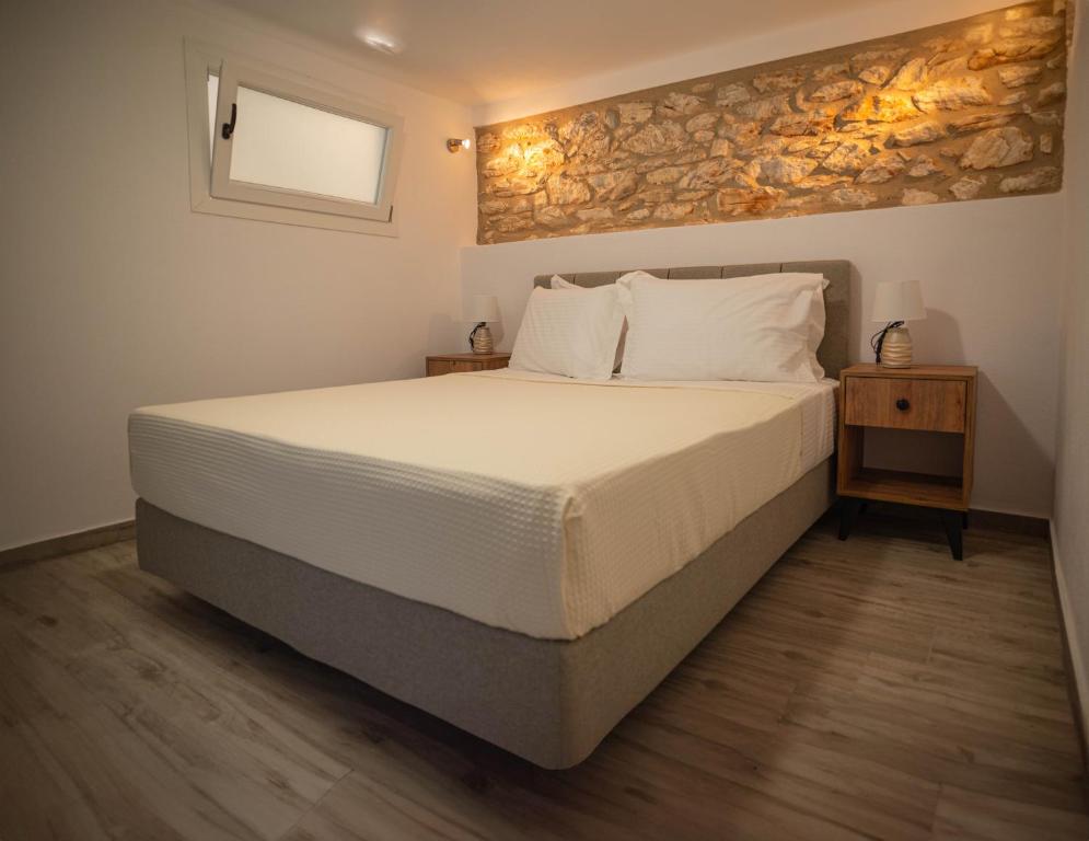 Postel nebo postele na pokoji v ubytování Balas House