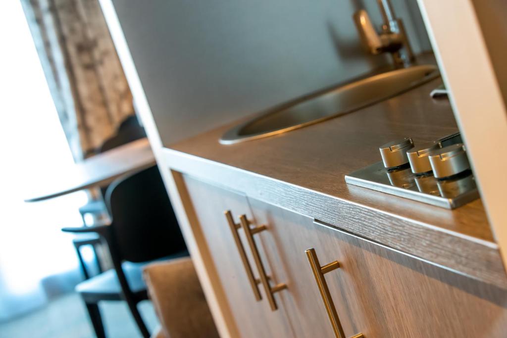 Kuchyň nebo kuchyňský kout v ubytování Best Western Eden SPA