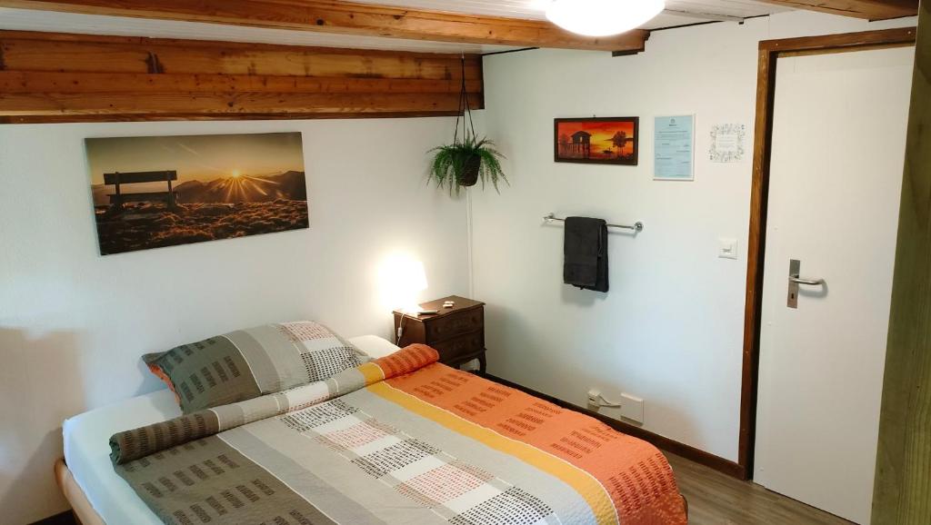Postel nebo postele na pokoji v ubytování Nisihof, Abendblick