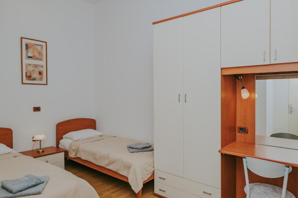 Łóżko lub łóżka w pokoju w obiekcie Villa Danex