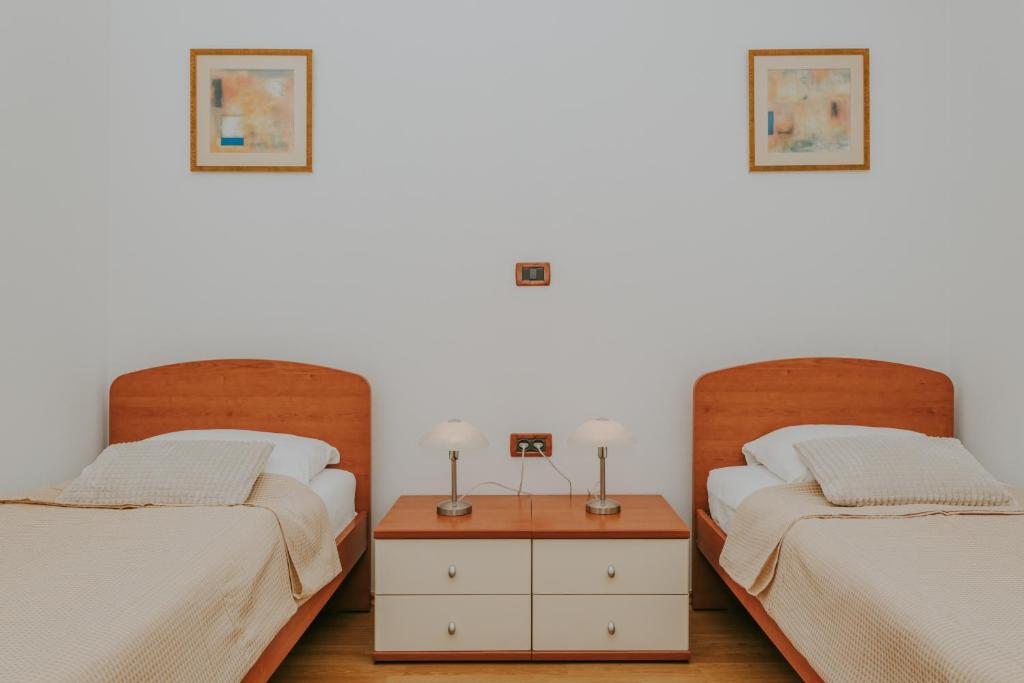 Łóżko lub łóżka w pokoju w obiekcie Villa Danex