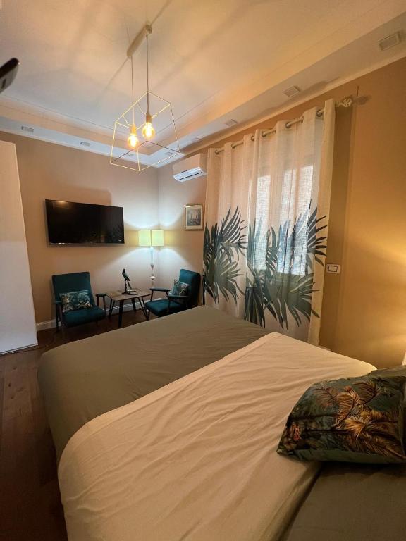 Postel nebo postele na pokoji v ubytování B&B Caffè Retro’