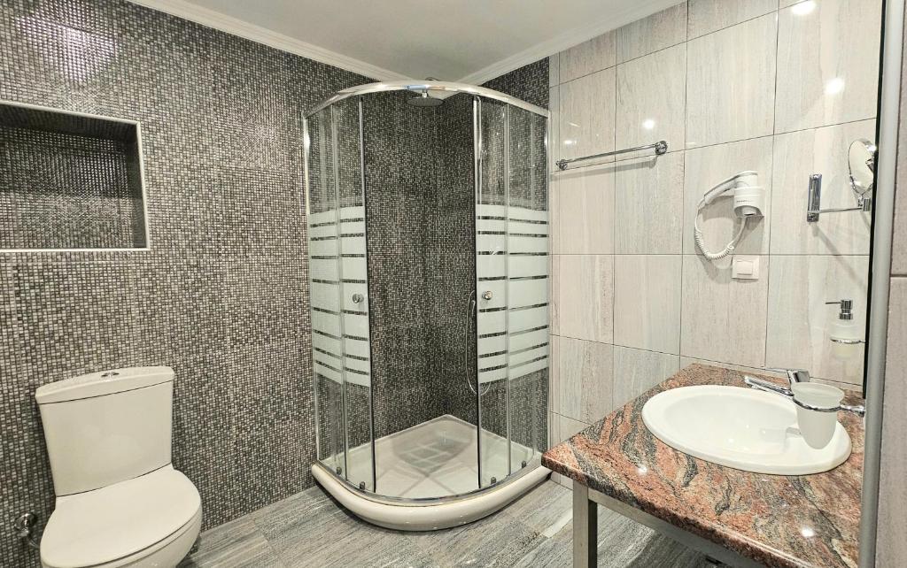 Koupelna v ubytování Minos Boutique Hotel