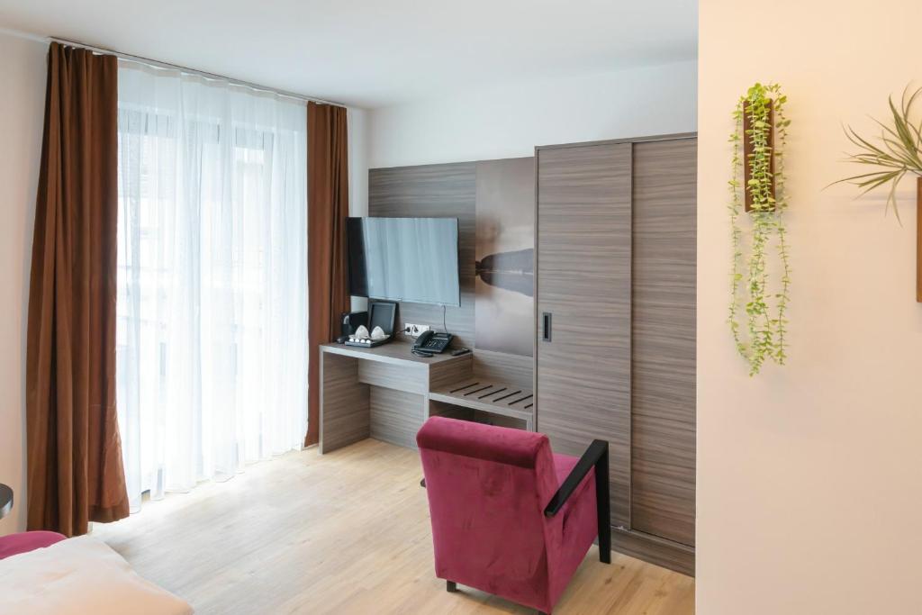 Kuchyň nebo kuchyňský kout v ubytování Central Hotel & Lounge Adult Only