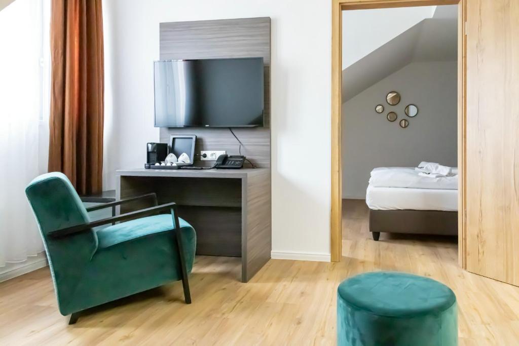 Postel nebo postele na pokoji v ubytování Central Hotel & Lounge Adult Only