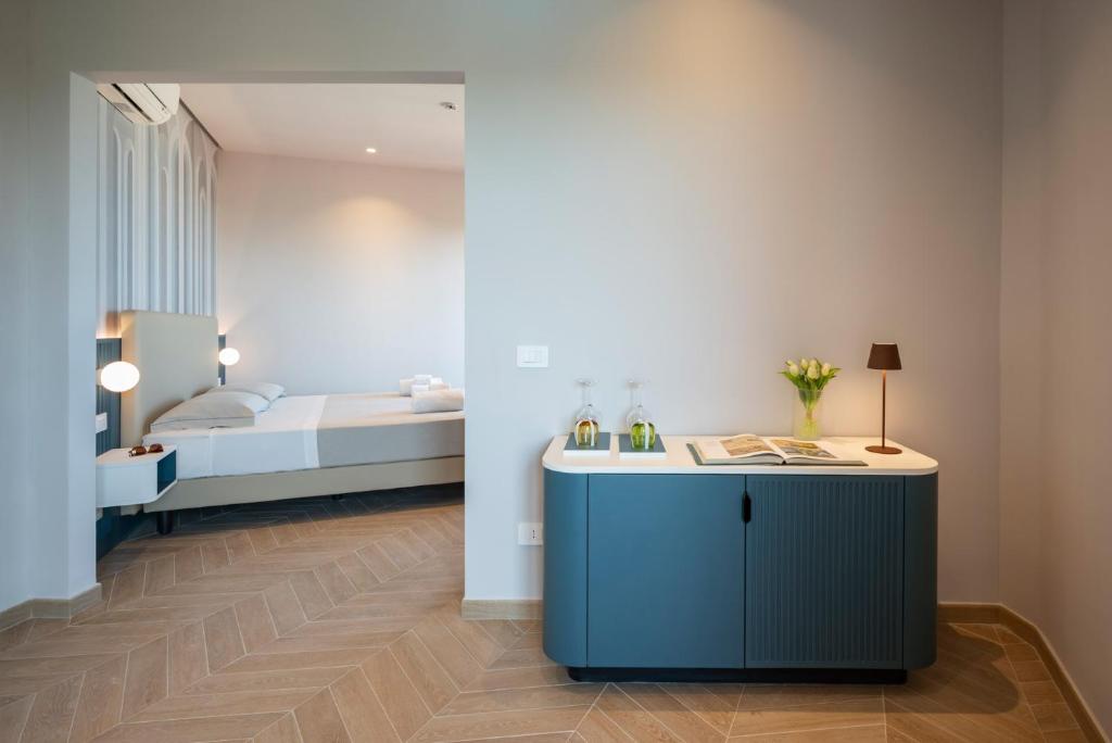 Postel nebo postele na pokoji v ubytování Hotel Playa Suite