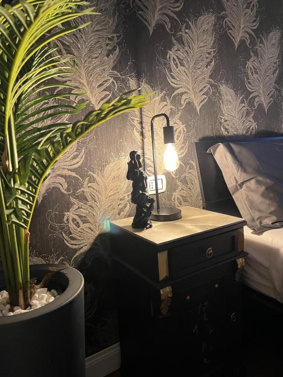Postel nebo postele na pokoji v ubytování B&B Caffè Retro’