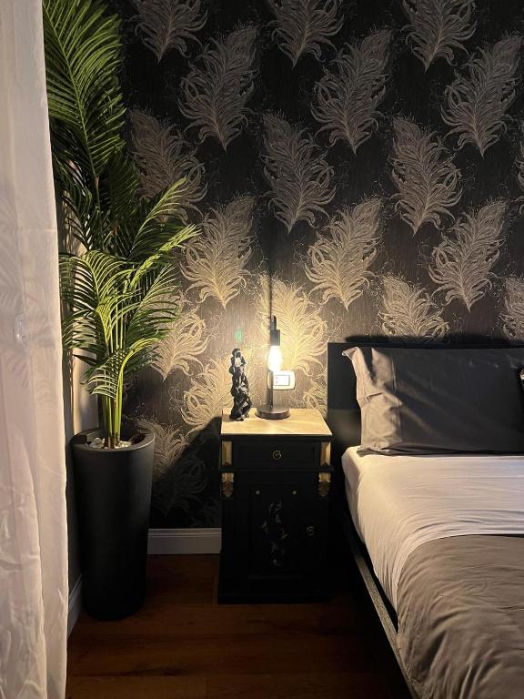 Postel nebo postele na pokoji v ubytování B&B Caffè Retro’