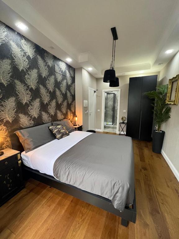 Postel nebo postele na pokoji v ubytování B&B Caffè Retro’