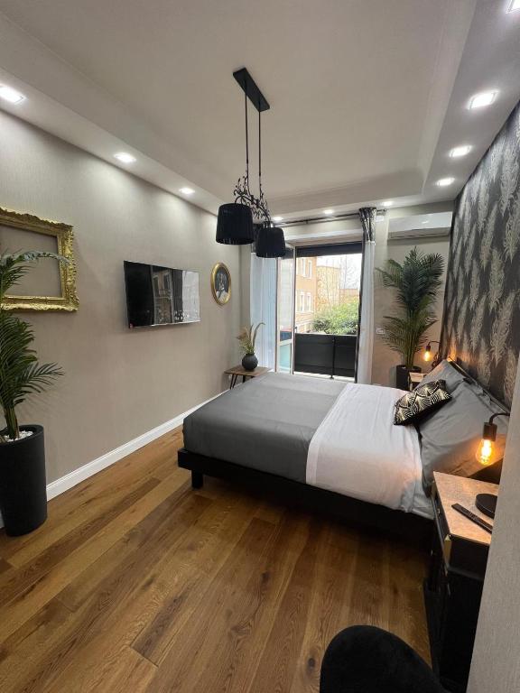 Postel nebo postele na pokoji v ubytování B&B Caffè Retro’
