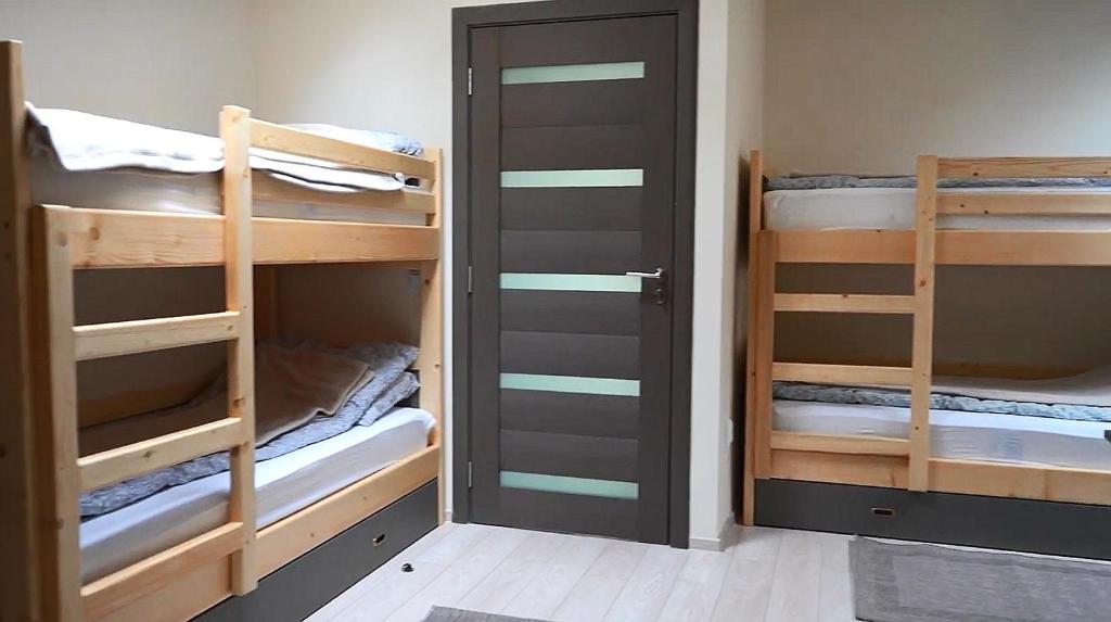 Postel nebo postele na pokoji v ubytování Park Hostel