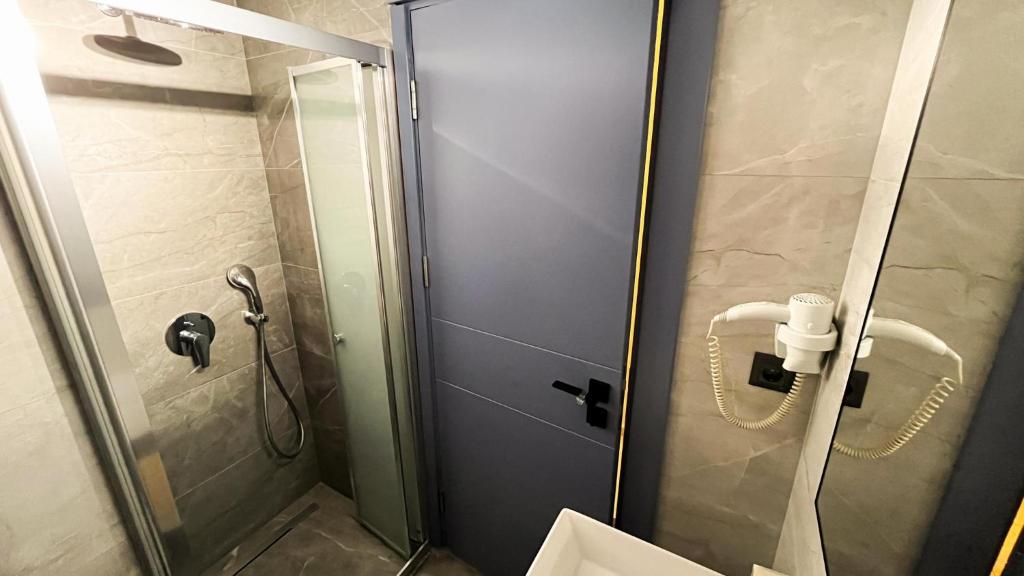 Koupelna v ubytování Ozlem 2 Apart Hotel