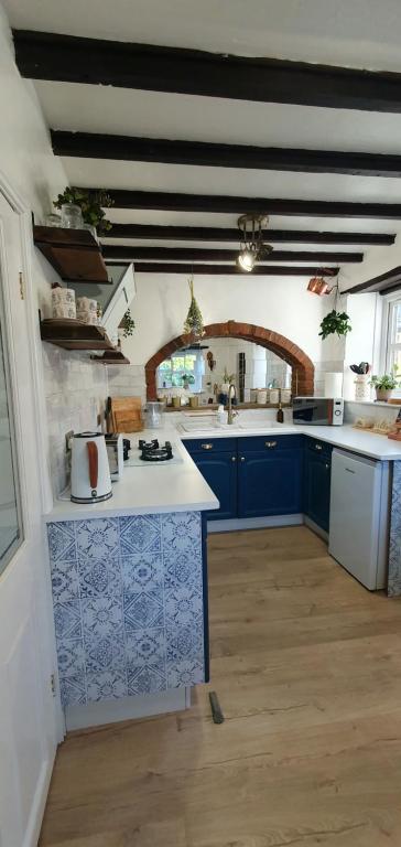 Køkken eller tekøkken på Beatrice Cottage