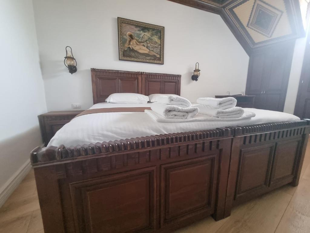 Een bed of bedden in een kamer bij HOTEL VILA TWIX
