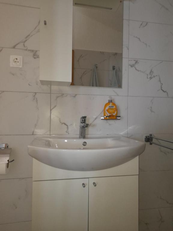 Kúpeľňa v ubytovaní Apartments Radica
