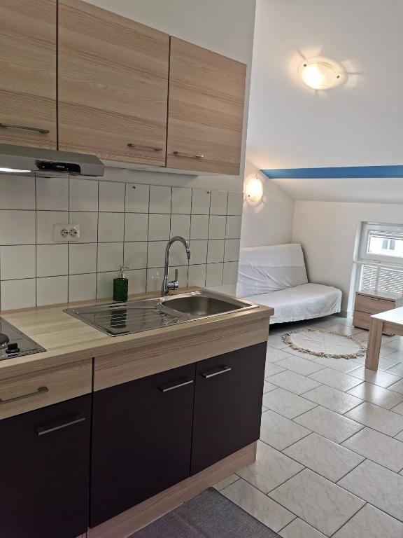 Kuchyň nebo kuchyňský kout v ubytování Apartments Riva Povljana