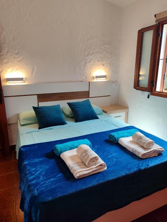 Postel nebo postele na pokoji v ubytování Las Tartanas Two Bedroom Bungalow