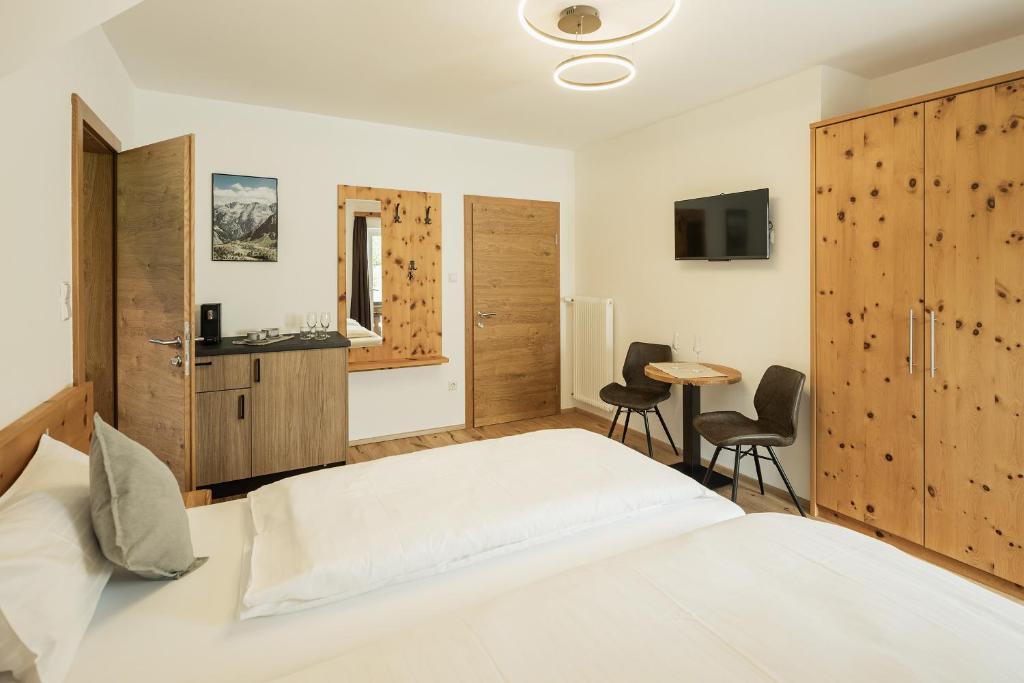 TV a/nebo společenská místnost v ubytování Rest Apartments & Suiten