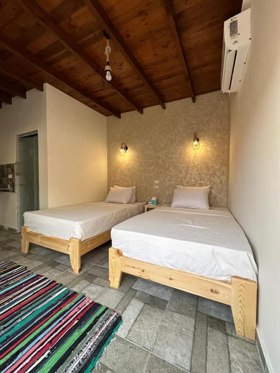 Postel nebo postele na pokoji v ubytování Balance Lodges