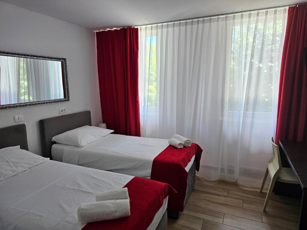 Postel nebo postele na pokoji v ubytování Hotel Prunk