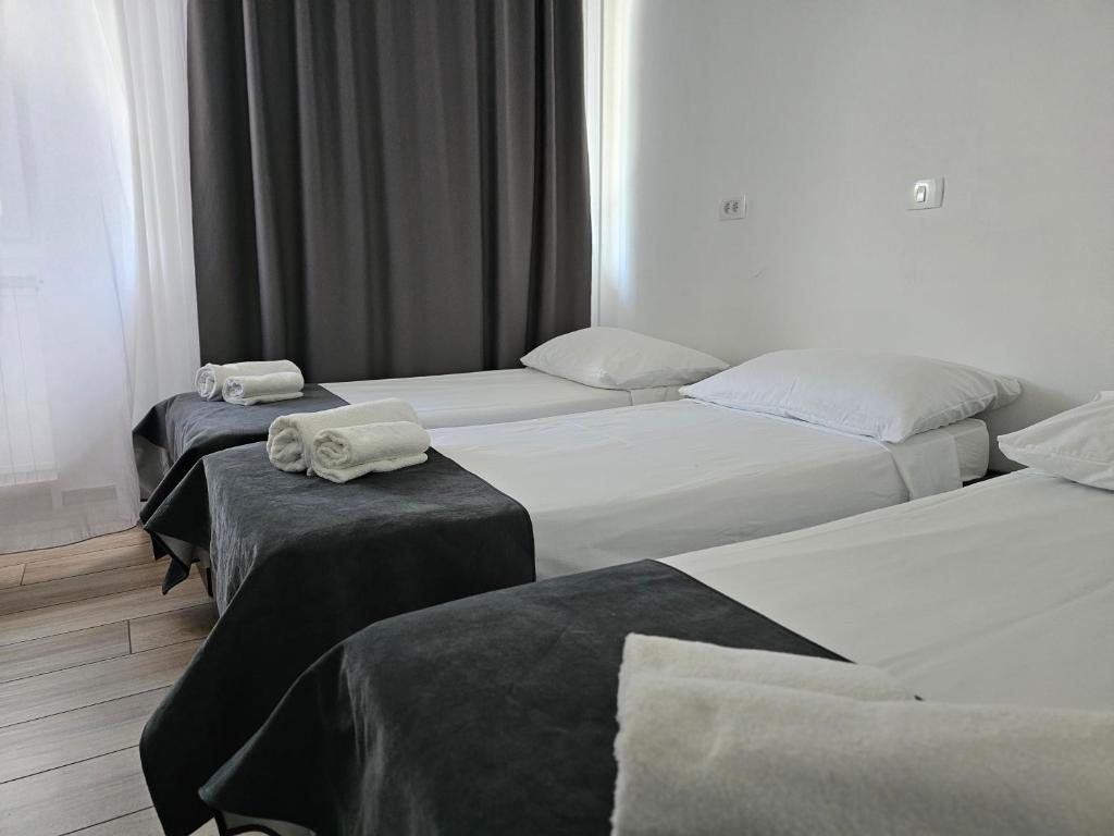 Postel nebo postele na pokoji v ubytování Hotel Prunk
