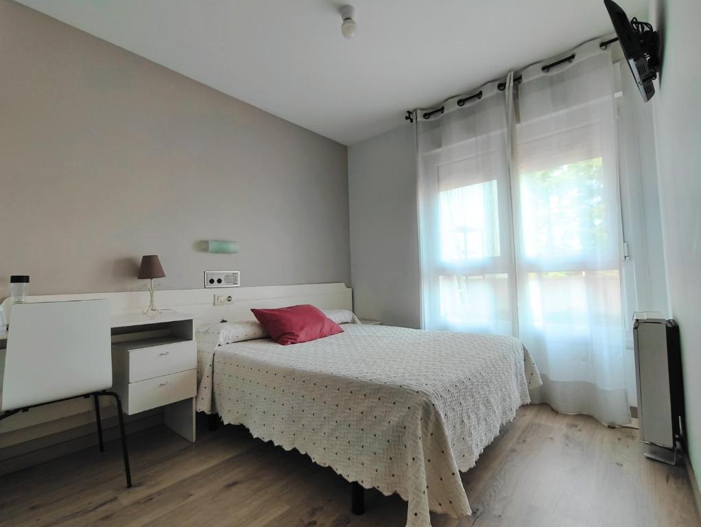 Posteľ alebo postele v izbe v ubytovaní Nest El Camino