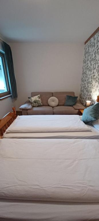 A bed or beds in a room at Villa Noce 2